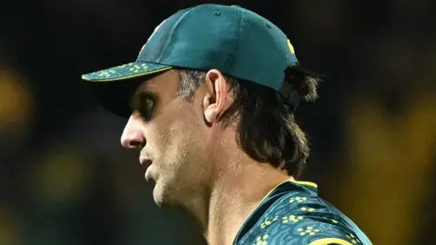 Mitchell Marsh looks on
