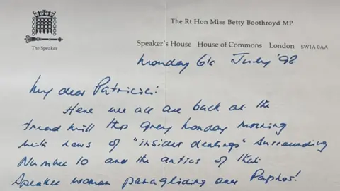 Stride & Son A handwritten letter on Speaker's House, House of Commons headed paper is dated Monday 6 July 1998. Several lines of blue handwritten text are seen with the reference to a trip to Paphos.