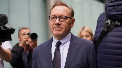 PA Media Kevin Spacey arrives at Southwark Crown Court