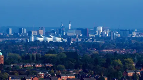 BBC Birmingham skyline showing office buildings and houses