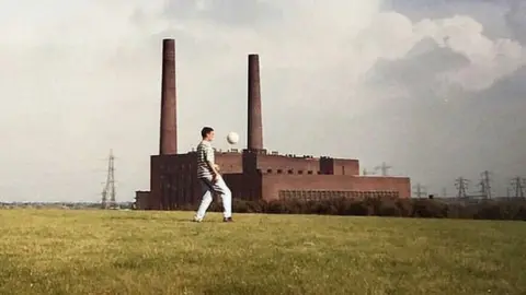 The People's Archive Keep ups in the shadow of Carrington Power Station. Irlam, 1990s