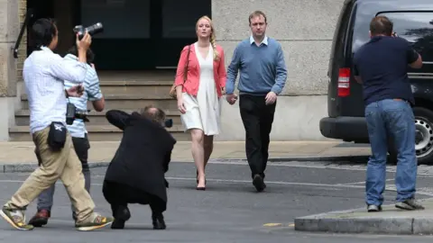 Getty Images Former trader Tom Hayes (R) and his wife Sarah arrive at Southwark Crown Court on August 3, 2015