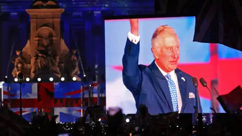 Getty Images The future King Charles on a big screen at the last major royal concert, the Queen's Platinum Jubilee, in 2022