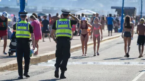 Getty Images Picture of police on the beach