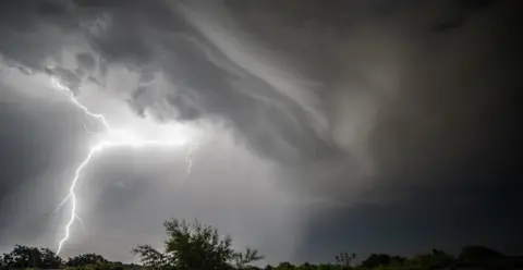 CJ Weather Watcher - CJ captured the lightning in a grey sky over Poole.