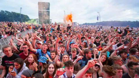 Getty Images Revellers at Leeds festival in 2021