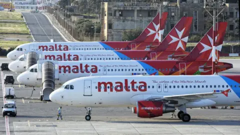 Kurt Arrigo Four Air Malta planes in a row