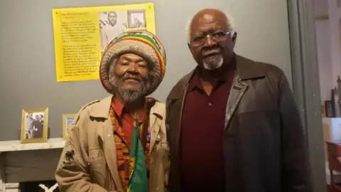 Shawn Sobers High Priest Ras Bandele Selassie with Dr Julius Garvey