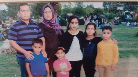 Family photo Hasna and her family, taken in Iraq in 2015