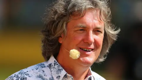 Getty Images James May speaks to the crowd during the Top Gear Festival at Sydney Motorsport Park on March 9, 2013 in Sydney, Australia