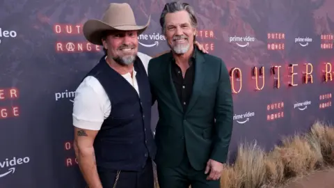 Matt Winkelmeyer/Getty Images Celebrity photographer Brian Bowen Smith with actor Josh Brolin