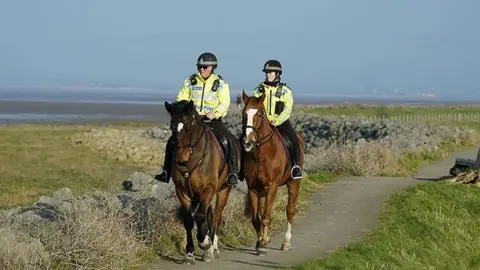 PA Media Mounted police in Knott End