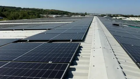 A stretch of roof showing solar panels