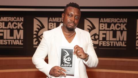 Director Ogo Okpue, winner of Best Director for the film "A Song from the Dark," poses at the Best of ABFF Awards Ceremony during the 2023 American Black Film Festival at New World Center on June 17, 2023 in Miami Beach, Florida.