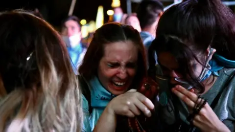 Reuters Anti-abortion demonstrators react as the senate debates an abortion bill, in Buenos Aires, Argentina, December 30, 2020.