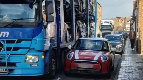 BBC Lorry passing a car