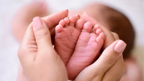 Getty Images Baby feet