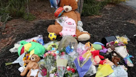 A makeshift memorial outside the home of Lindsay Clancy