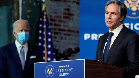 Reuters File photo showing Antony Blinken speaking next to Joe Biden (24 November 2020)