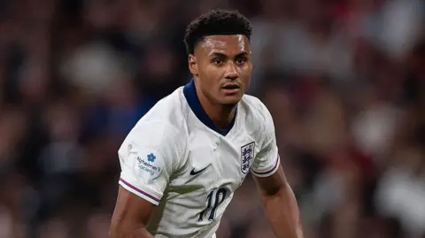 Aston Villa striker Ollie Watkins in action for England