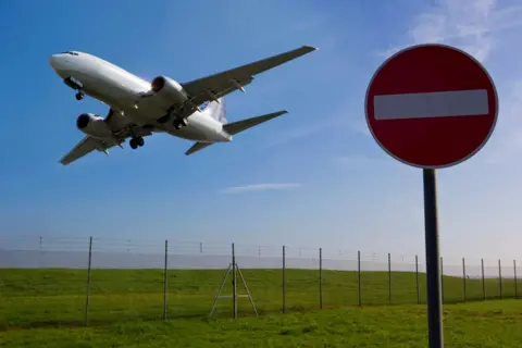 Getty Images A plane ascending after take off from Stansted Airport