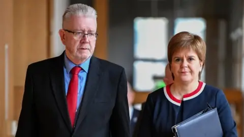 Getty Images Mike Russell and Nicola Sturgeon