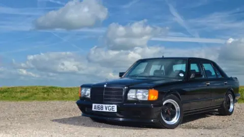 Omega Auctions/D Brewis Black Mercedes AMG owned by George Harrison