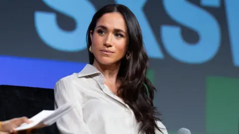 Britain's Meghan, Duchess of Sussex, attends the "Keynote: Breaking Barriers, Shaping Narratives: How Women Lead On and Off the Screen," during the SXSW 2024 Conference and Festivals at the Austin Convention Center on March 8, 2024, in Austin, Texas. (Photo by SUZANNE CORDEIRO/AFP via Getty Images)
