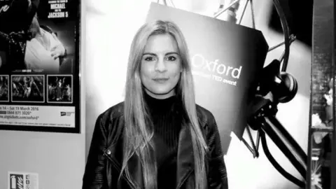 Jennifer Cassidy Jennifer Cassidy posing in a black and white photograph