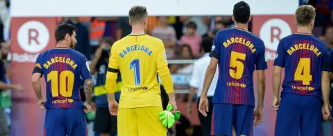AFP/getty Images Barcelona's Argentinian forward Lionel Messi, German goalkeeper Marc-Andre Ter Stegen and teammates stand with their jerseys reading "Barcelona"