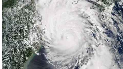 AFP Typhoon Lingling seen by Nasa's Earth Observatory as it approached the Korea peninsula on Friday, 6 September