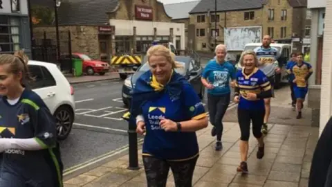 Pudsey Runners People running in street