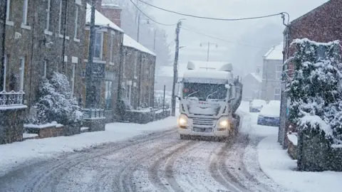 Schools closed and roads impassable by snow