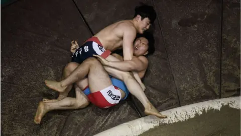 AFP/Getty Korean wrestlers