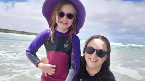 Caroline Henderson Aibhilin Henderson with her mother Caroline