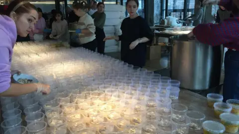 Ruslan Buriak  Preparing food packages