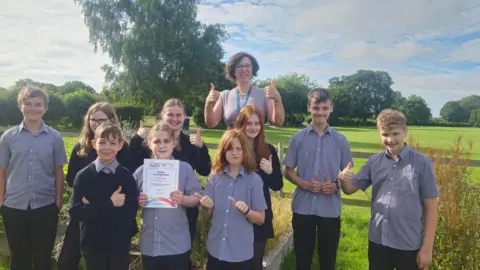 Wiltshire Council A group of school children stood in a field