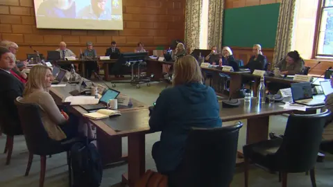 People in child scrutiny meeting Devon