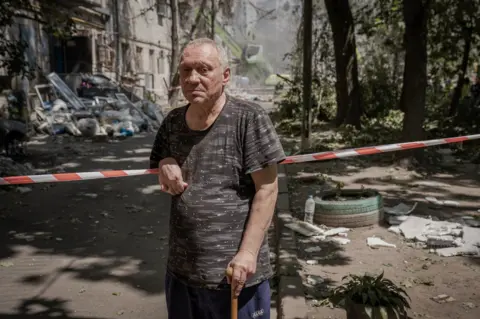 BBC Oleksandr Bondarchuk was unable to make it to a shelter when the strikes hit Kyiv. ""It was terrible," he said. "Everything was destroyed."
