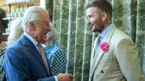 King Charles greets David Beckham during a visit to the RHS Chelsea Flower Show
