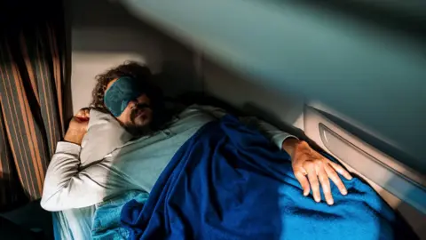 Getty Images Man sleeping