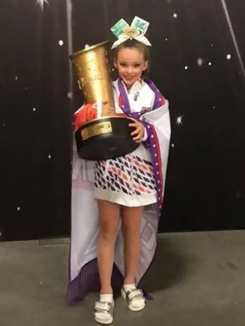 Gwyneth Morgan Ruby Richards with the trophy