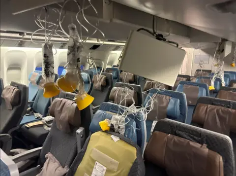 Reuters The interior of Singapore Airline flight SG321 is pictured after an emergency landing at Bangkok"s Suvarnabhumi International Airport, Thailand, May 21, 2024.