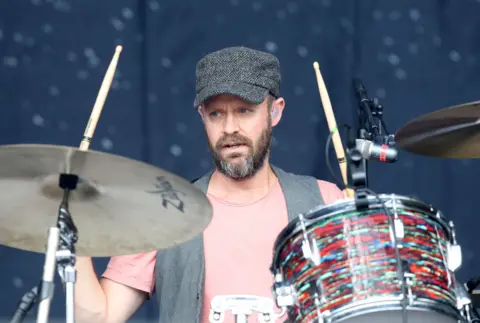 Simone Joyner/Getty Images Rick McMurray from Ash