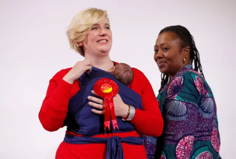 Reuters Labour's Stella Creasy with her baby daughter