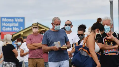 EPA People line up for testing at walk-in clinic in Sydney's Northern Beaches region