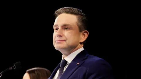 Reuters Conservative Party of Canada's leader Pierre Poilievre looks on at his election night headquarters in Ottawa, Ontario, Canada April 29, 2025.
