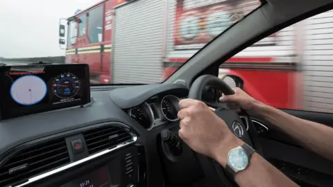 PA Man in car with dashboard