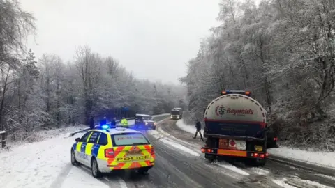 Cumbria Police Dog Unit vehicles stranded on the A590 between Newby Bridge and Haverthwaite