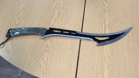 Emma Glasbey / BBC Large knife